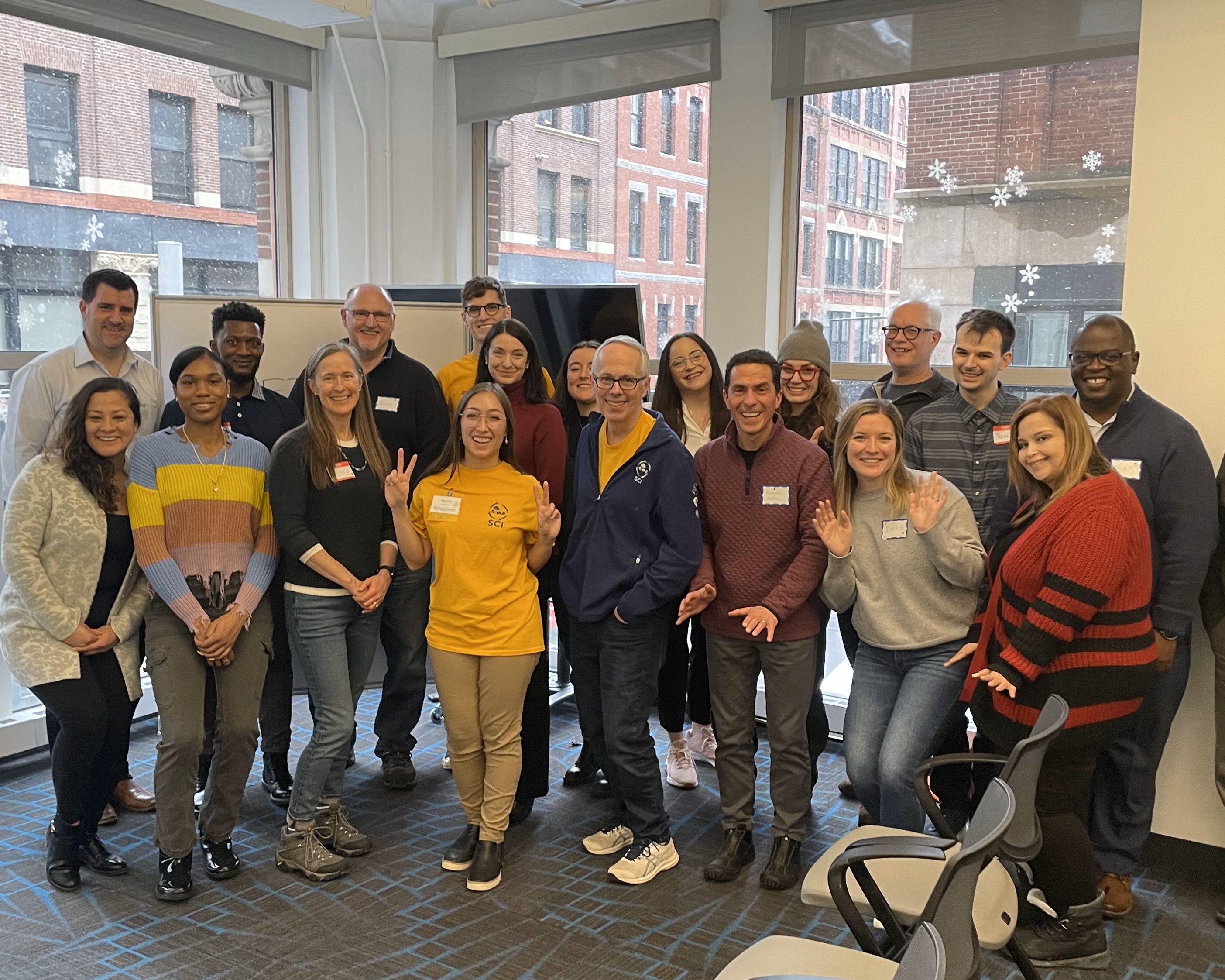 SCI’s 2025 Youth Grant Pitch Contest volunteer Pitch Coaches pose for a photo at the Kickoff Celebration. Pictured in the center back is SCI AmeriCorps Fellow Sam Gerry, in the center front left is SCI Program Manager Nicole Osborne, and in the center front right is SCI President David Crowley.