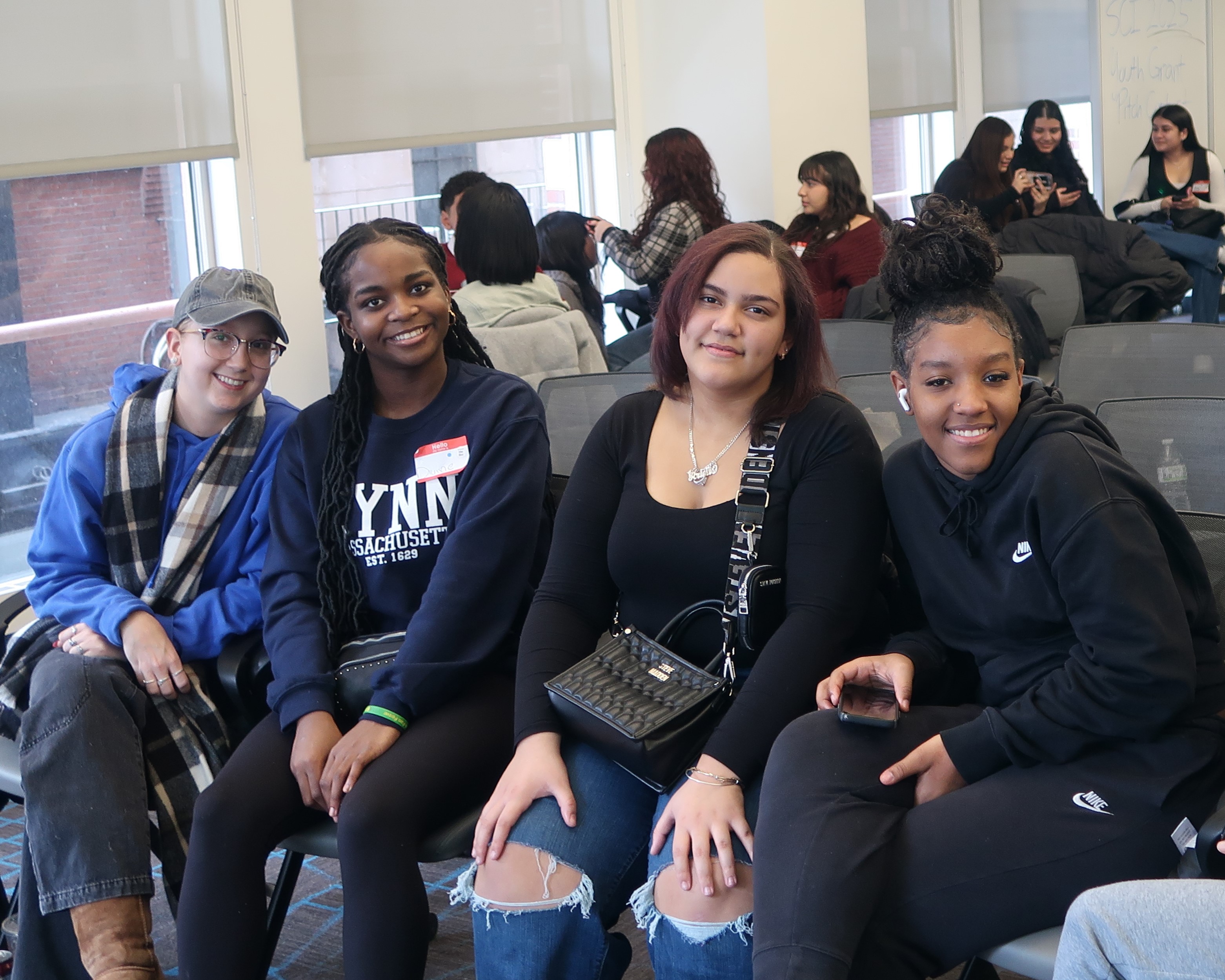 Returning for their second year in the SCI Youth Grant Pitch contest, the Lynn Lady Leaders youth team posing at the Kickoff Celebration. Their 2025 project goal is to empower youth through group projects and discussions on self-care, healthy lifestyles, and peer support.